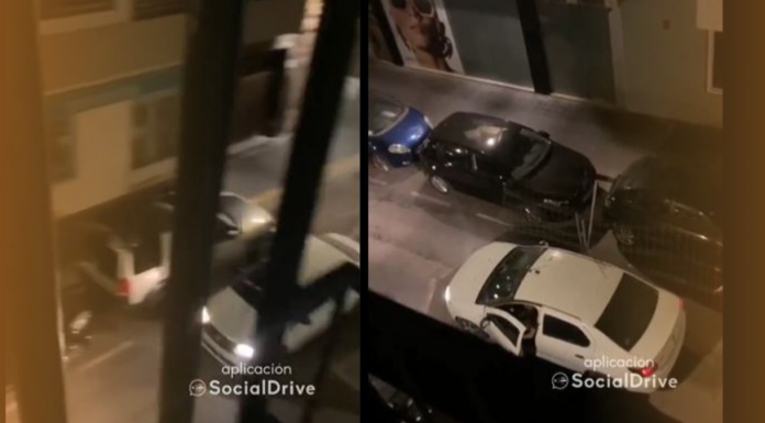 Un coche circula en dirección contraria y arrastrando una valla en Valencia Un coche circula en dirección contraria y arrastrando una valla en Valencia