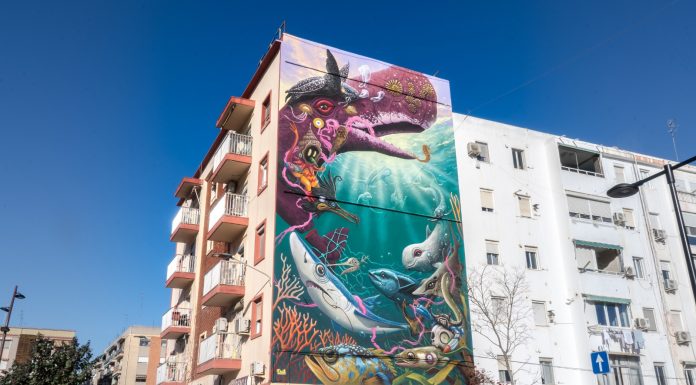 El artista urbano Dulk dibuja un mural gigante en el barrio del Cabanyal
