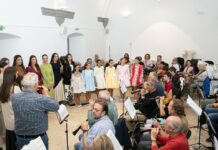Les Bellees del Foc visitan València en un encuentro con las Falleras Mayores de València Belleas del Foc de Alicante junto a las Falleras Mayores de València 2026 en Junta Central Fallera